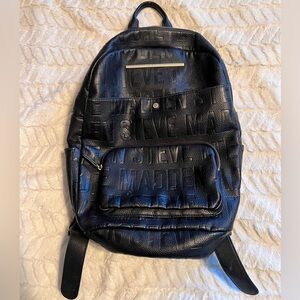 Steve Madden Black Embossed Logo Backpack with Front Zip Pocket